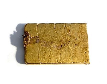 Gold DEBRI: a plate of molten gold 750 thousandths.
Weight...