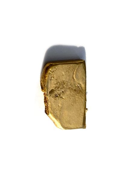 Gold DEBRI: a plate of molten gold 750 thousandths.
Weight...