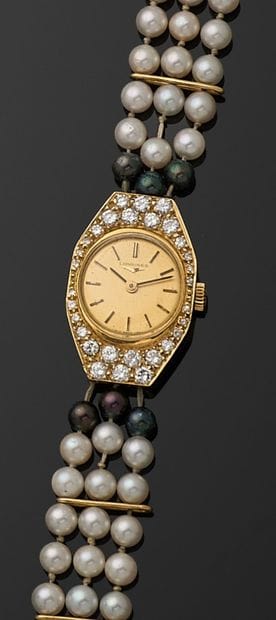MONTRE bracelet de dame en or jaune 750 millièmes,...