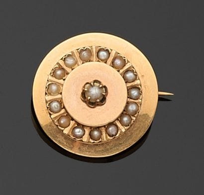 BROCHE de forme ronde en or jaune 750 millièmes...