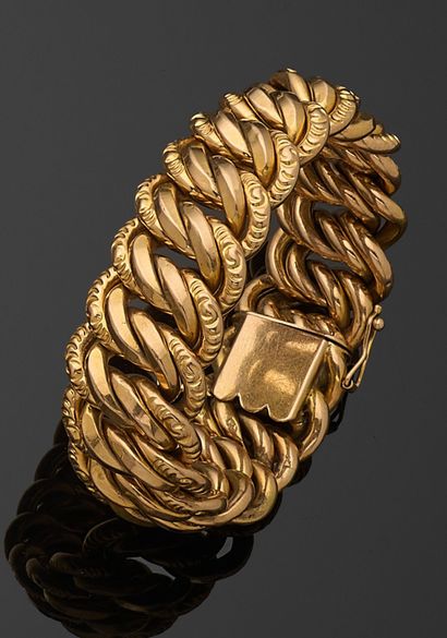 BRACELET articulé en or jaune 750 millièmes,...