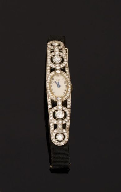 MONTRE bracelet de dame en or gris 750 millièmes...