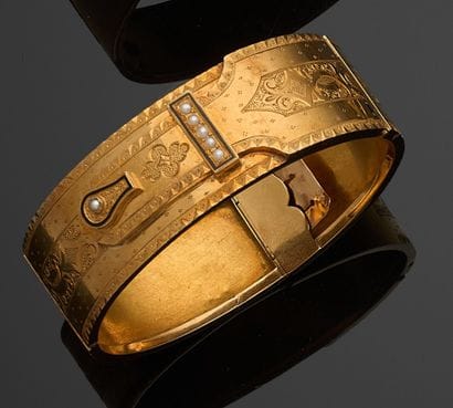 BRACELET rigide et ouvrant en or jaune 750...