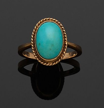 BAGUE en or jaune 750 millièmes, le centre...