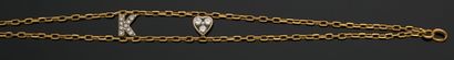 REPOSSI
Bracelet deux brins articulé en or...