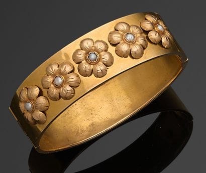 BRACELET rigide et ouvrant en or jaune 750...