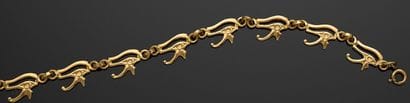 BRACELET articulé en or jaune 750 millièmes,...