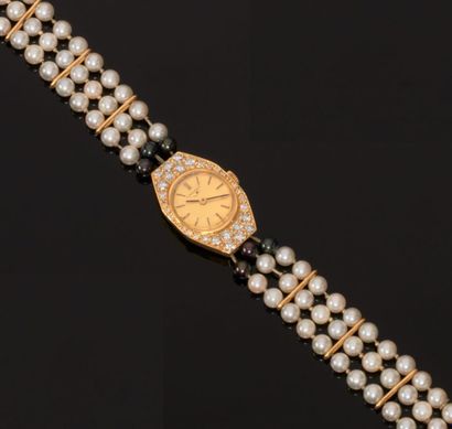 MONTRE bracelet de dame en or jaune 750 millièmes,...