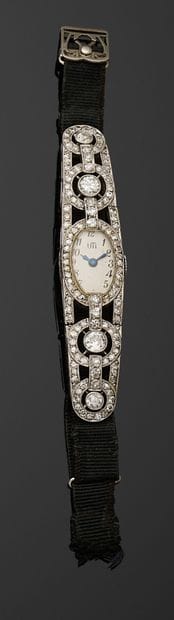 MONTRE bracelet de dame en or gris 750 millièmes...