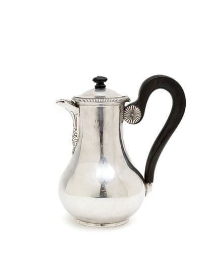 Silver flat-bottomed VERSEUSE, the spout...