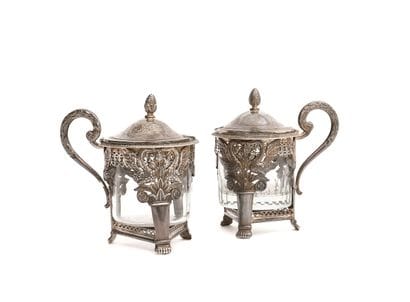 PAIR OF SILVER MOUTARDIERS, standing on three...