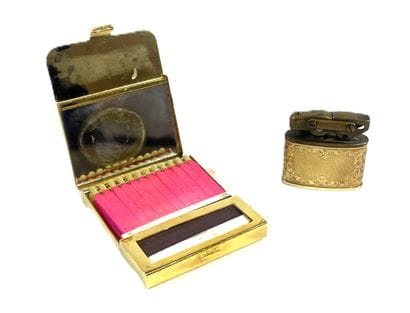 BRIQUET in gilt metal and 585 thousandths...