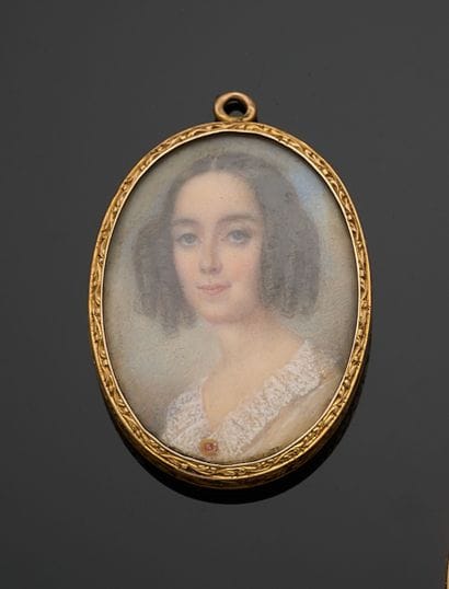 PENDANT in engraved 750 thousandths yellow...