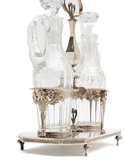 SILVER HOLDER, resting on four feet, the...