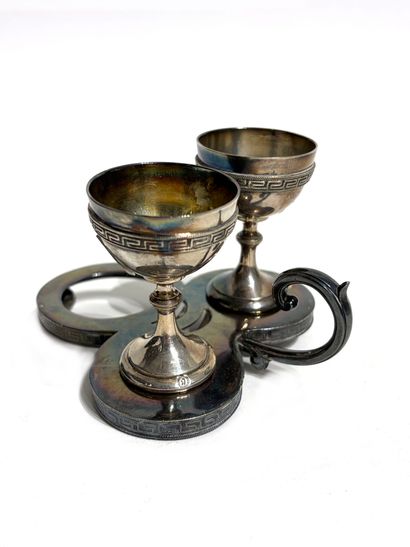 SET of two silver-plated egg cups, decorated...