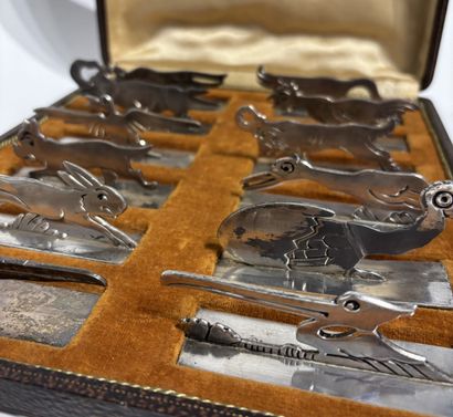 TWELVE silver-plated 