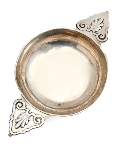Silver ECUELLE, the ears applied with palmettes,...