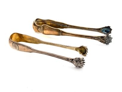 TWO 925-milliliter silver sugar tongs, one...