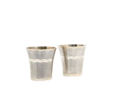 TWO TIMBALES in silver 800 thousandths, with...