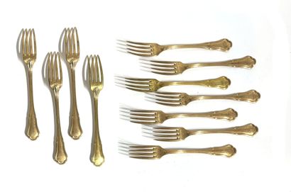 CHRISTOFLE, 
Eleven forks in gilded metal,...