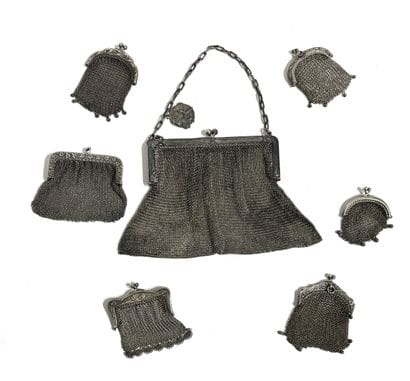 SET of seven chainmail purses in 800 thousandths...
