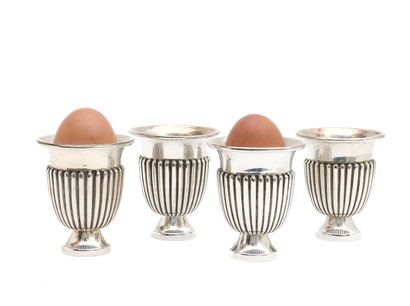 FOUR godronned TIMBALES in silver 916 thousandths,...