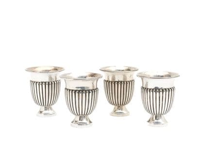 FOUR godronned TIMBALES in silver 916 thousandths,...