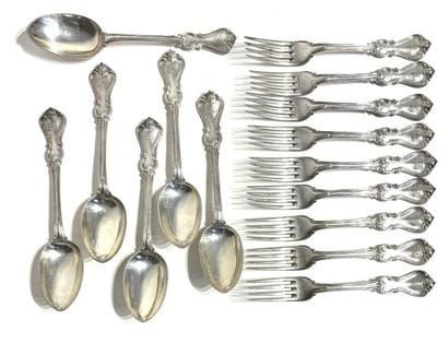 SET of nine table forks and six table spoons...
