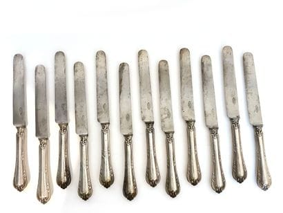 TWELVE table knives in 925 thousandths forged...