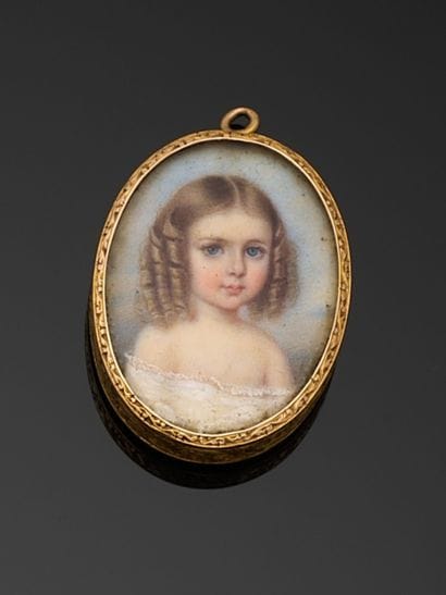 PENDANT in engraved 750 thousandths yellow...