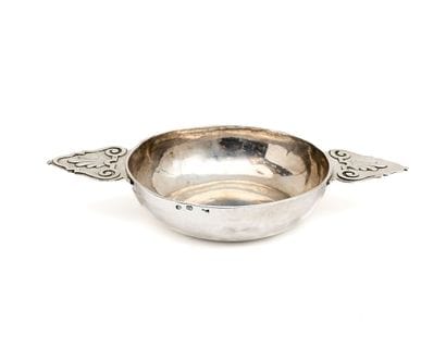 Silver ECUELLE, the ears applied with palmettes,...