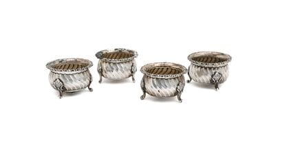 SET of four round tripod salt cellars with...