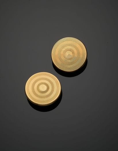 Pair of round neck studs in fully engraved...