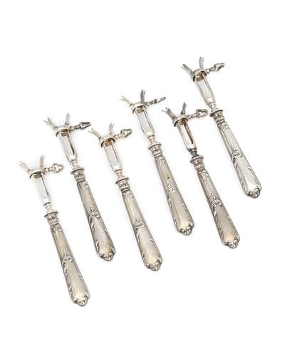 SET of six silver and metal chop handles,...