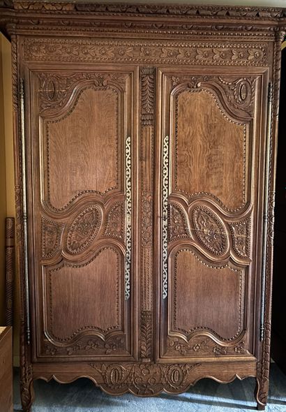NORMANDE ARMOIRE in molded and carved wood,...