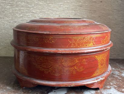 CHINA
Red lacquered wood round quadripod...