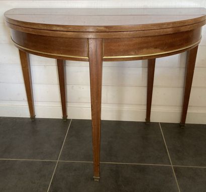TABLE DEMIE-LUNE in veneered wood and gilt...