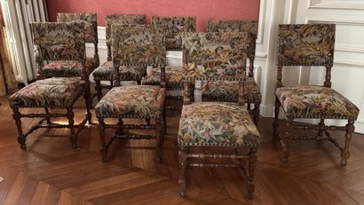 SUITE OF EIGHT CHAIRS in turned wood, the...