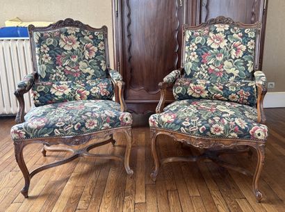 Pair of varnished and carved wooden armchairs,...