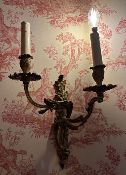 Pair of gilded bronze wall lights with two...
