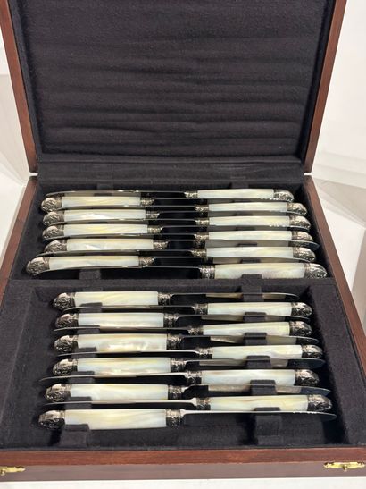 SET IN SILVER METAL, with mother-of-pearl...