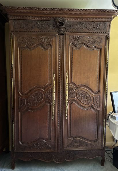 NORMANDE ARMOIRE in carved molded oak, opening...