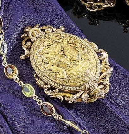 BROCHE en ors 18 k de plusieurs tons figurant...
