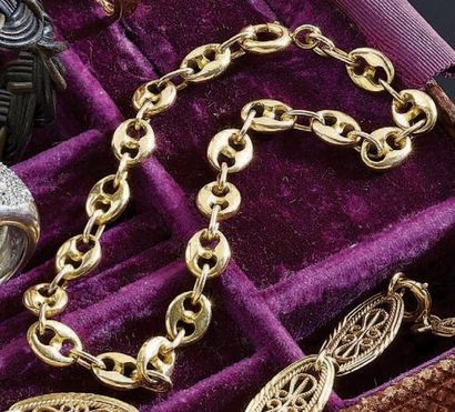 BRACELET articulé en or jaune 18 k ajouré,...