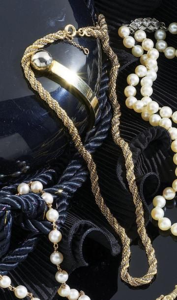 COLLIER articulé en ors 18 k de deux tons,...