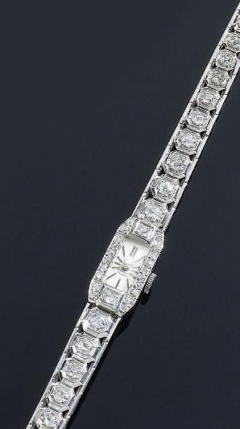 MONTRE bracelet de dame en or gris 18 k et...