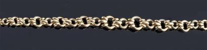 COLLIER articulé en or jaune 18 k ajouré,...