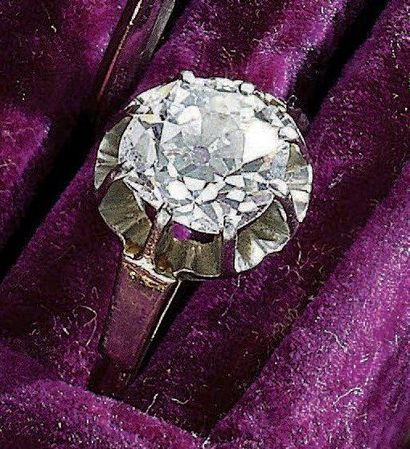 BAGUE en or gris 18 k ornée d'un diamant...