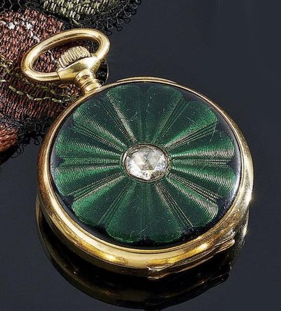 MONTRE de dame à remontoir au pendant, en...