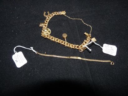 BRACELET articulé en or jaune 18 k retenant...